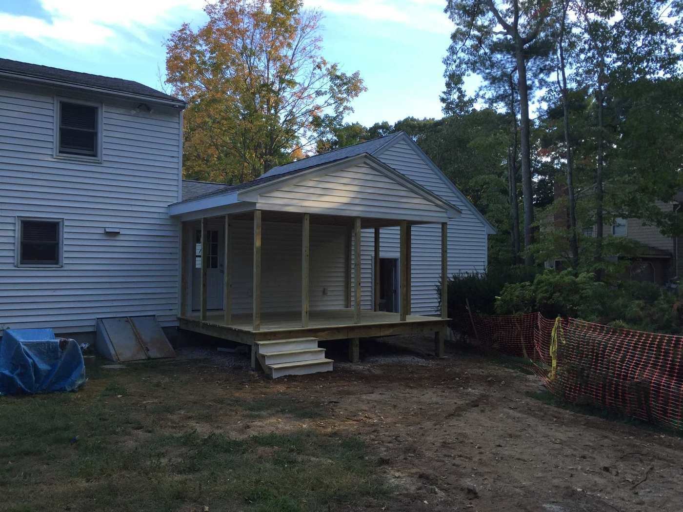 Breezeway with windows in and siding started